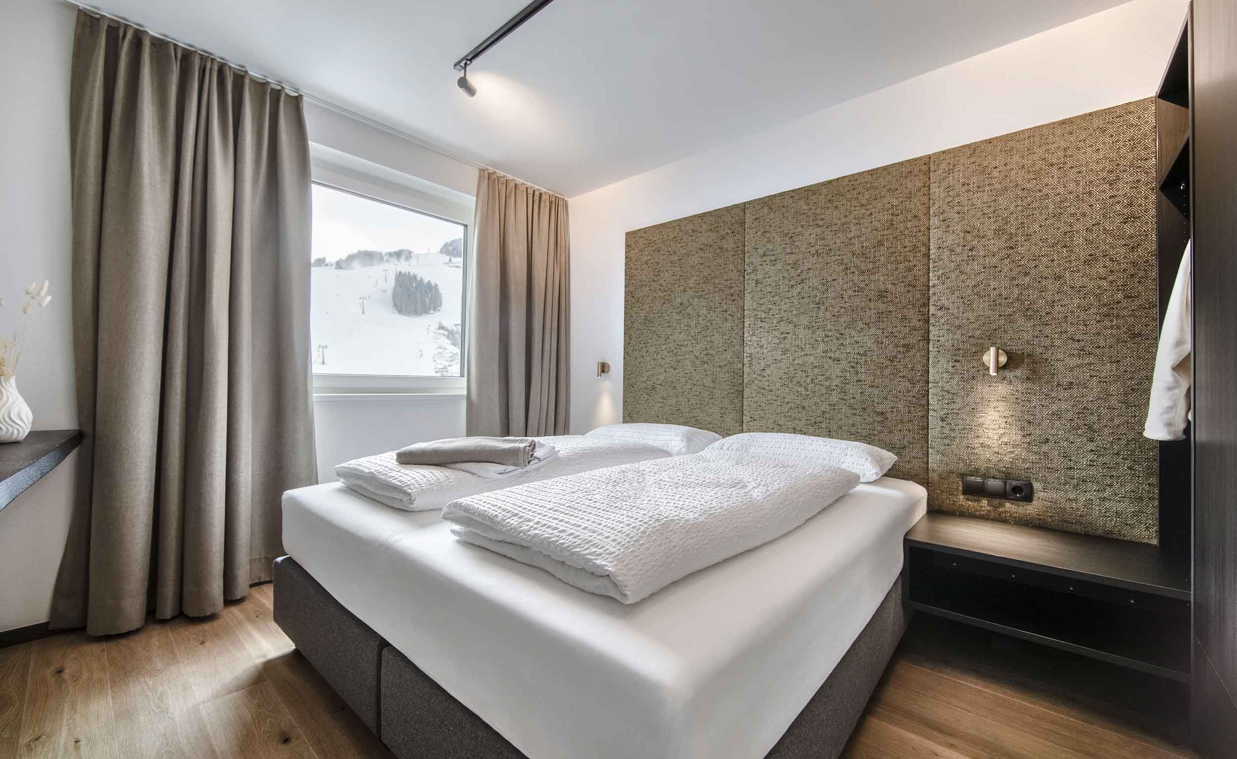 EAGLE Suite: Schlafzimmer mit Pistenblick